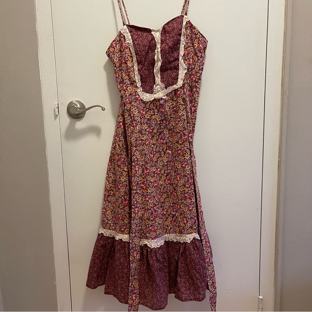 pink vintage floral 70s dress with lace trim and tie back